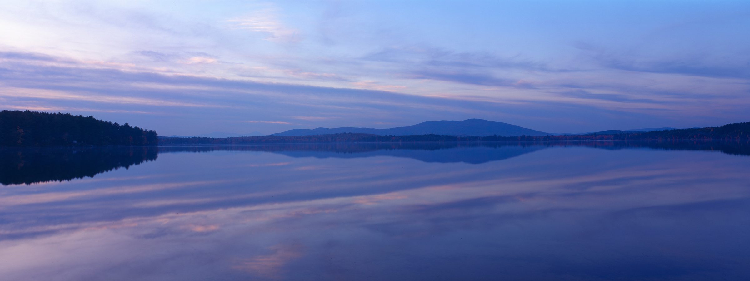 The lake at dusk, sky and water in shades of violet