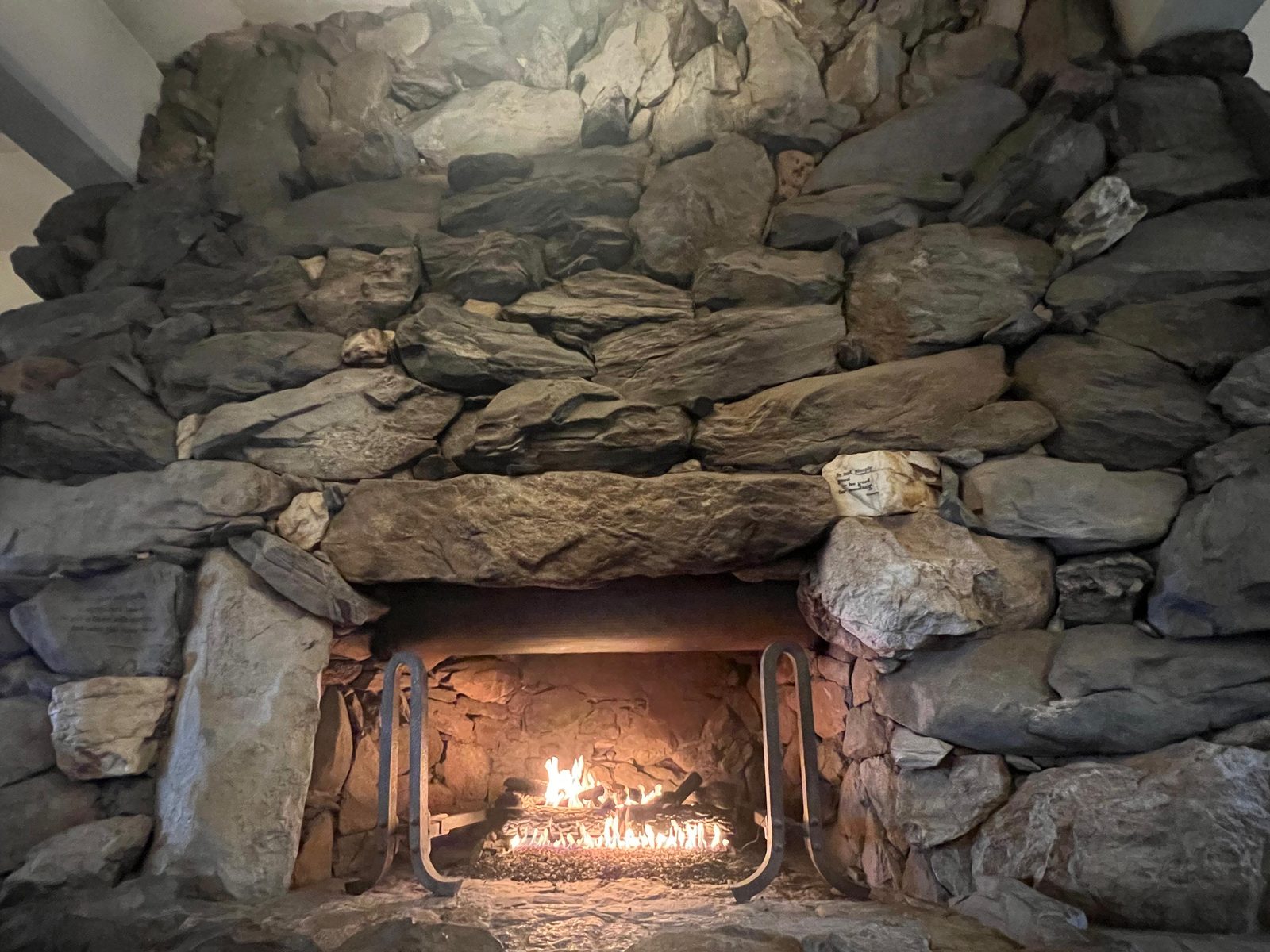 The stone fireplace at Stone’s Throw