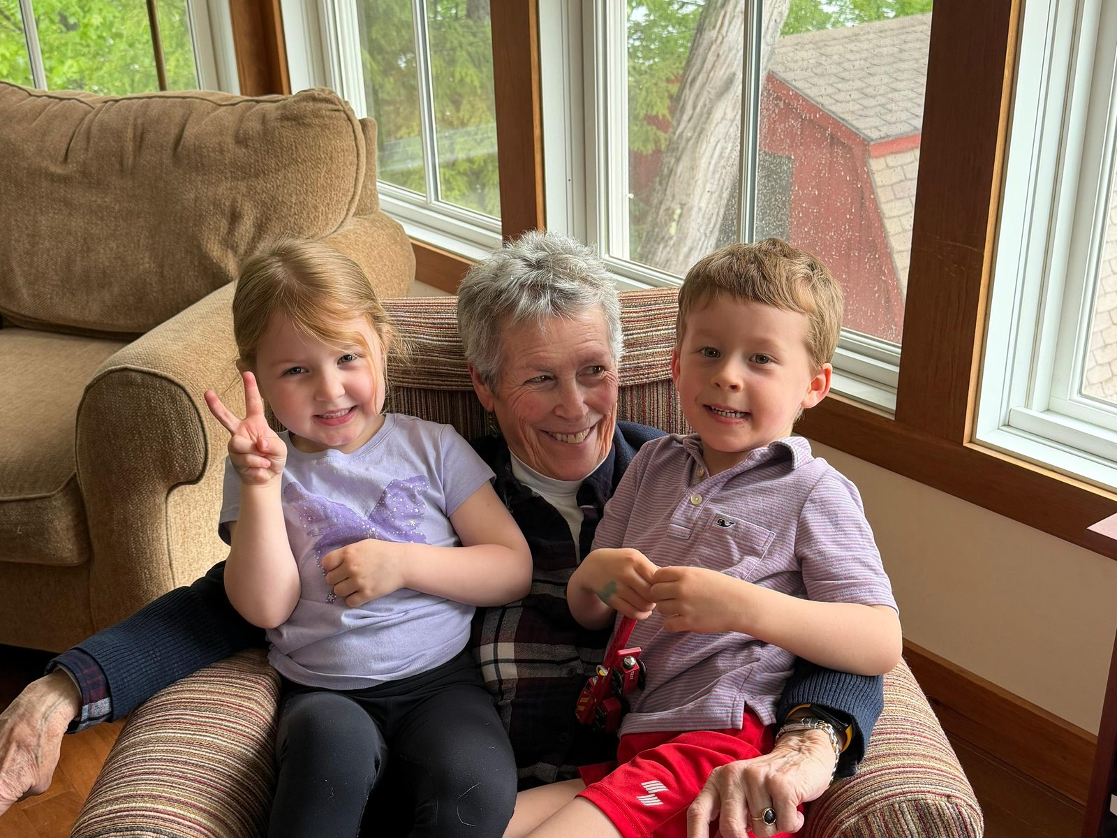 Kate and two of the third generation, on the good chair