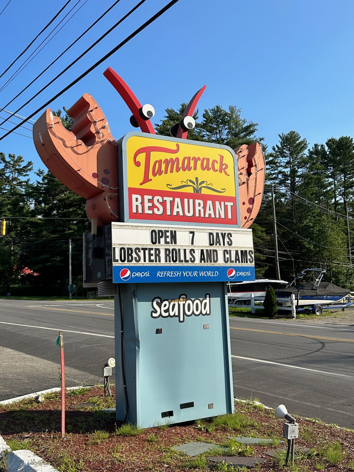 The Tamarack sign: open 7 days, lobster rolls and clams